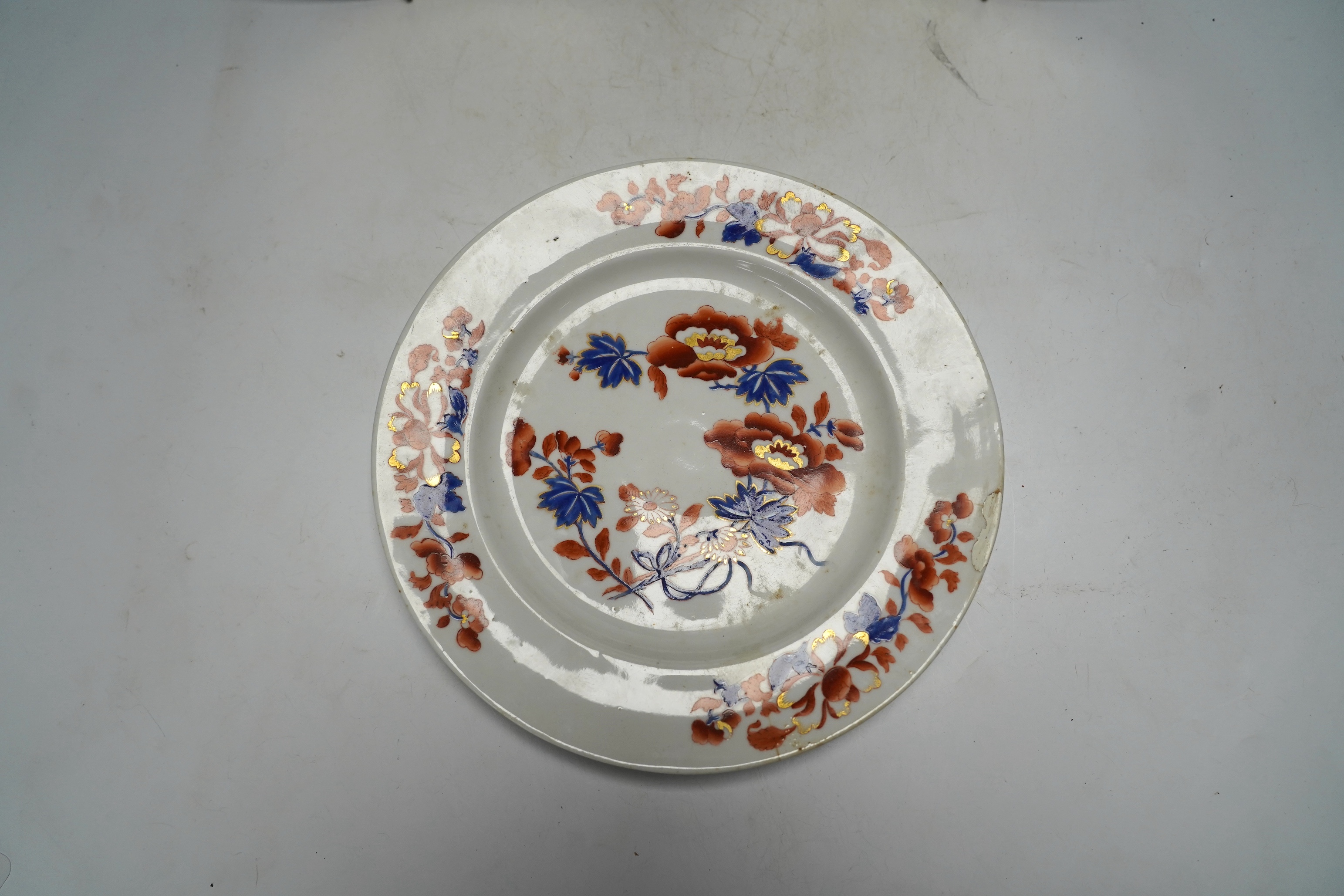 Three Derby landscape plates, attributed to George Robertson, c.1795, two decorated with Scottish scenes, the other Italian scene and a Chamberlains Imari pattern plate, 25cm (4)